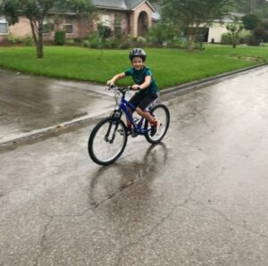 Jack Judge rides his bike