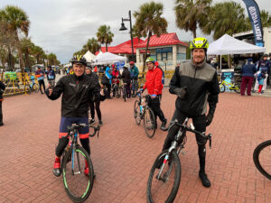 two riders give a thumbs up in starting area