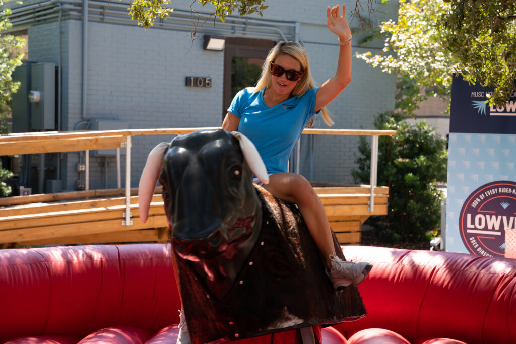 woman riding mechanical bull