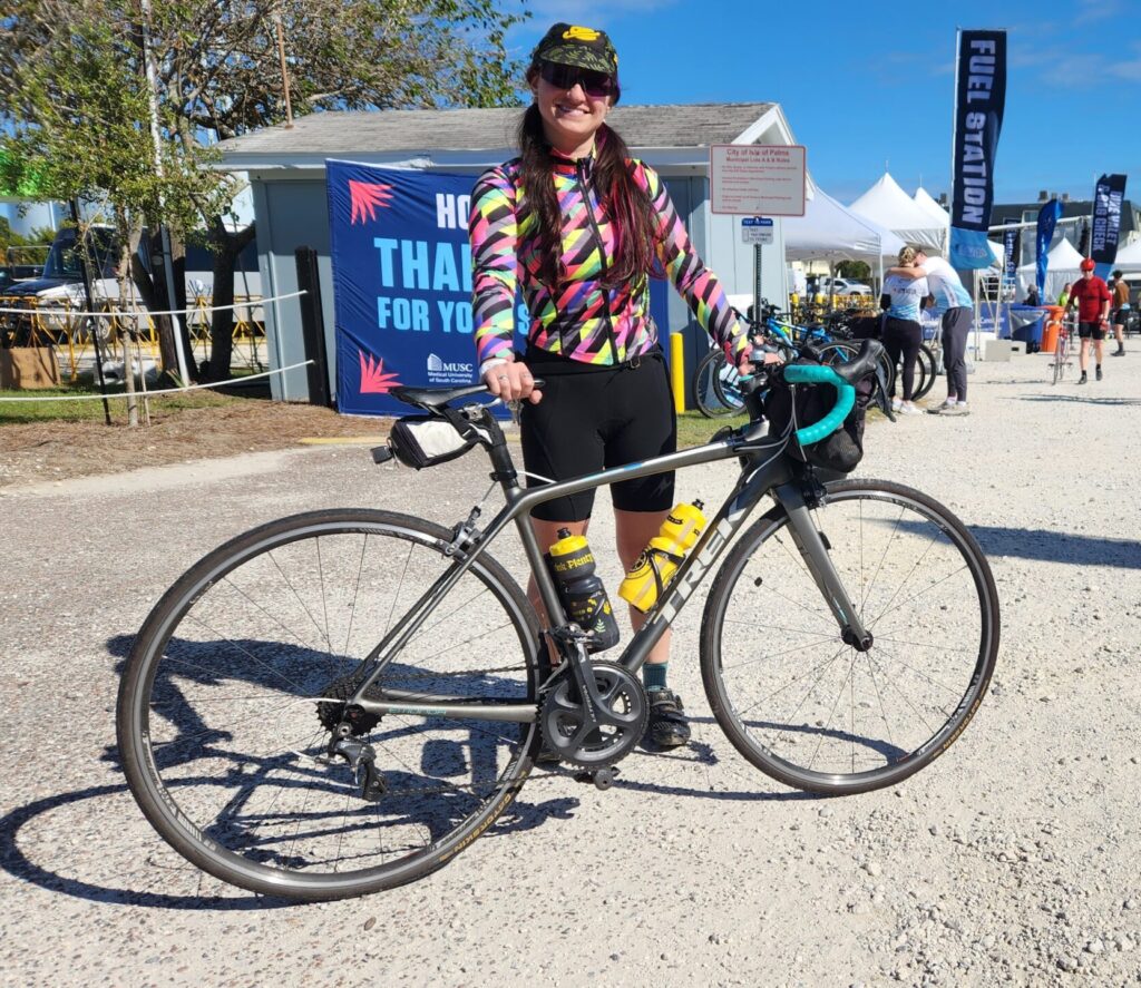 woman standing with bicycle at Lowvelo in 2024