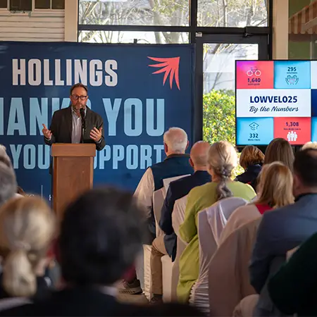 Lowvelo director Chris Winn talks to a packed room at the Lowvelo 25 awards