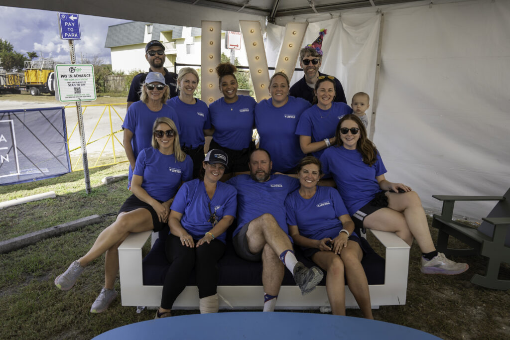 group of Lowvelo staff members in blue t shirts