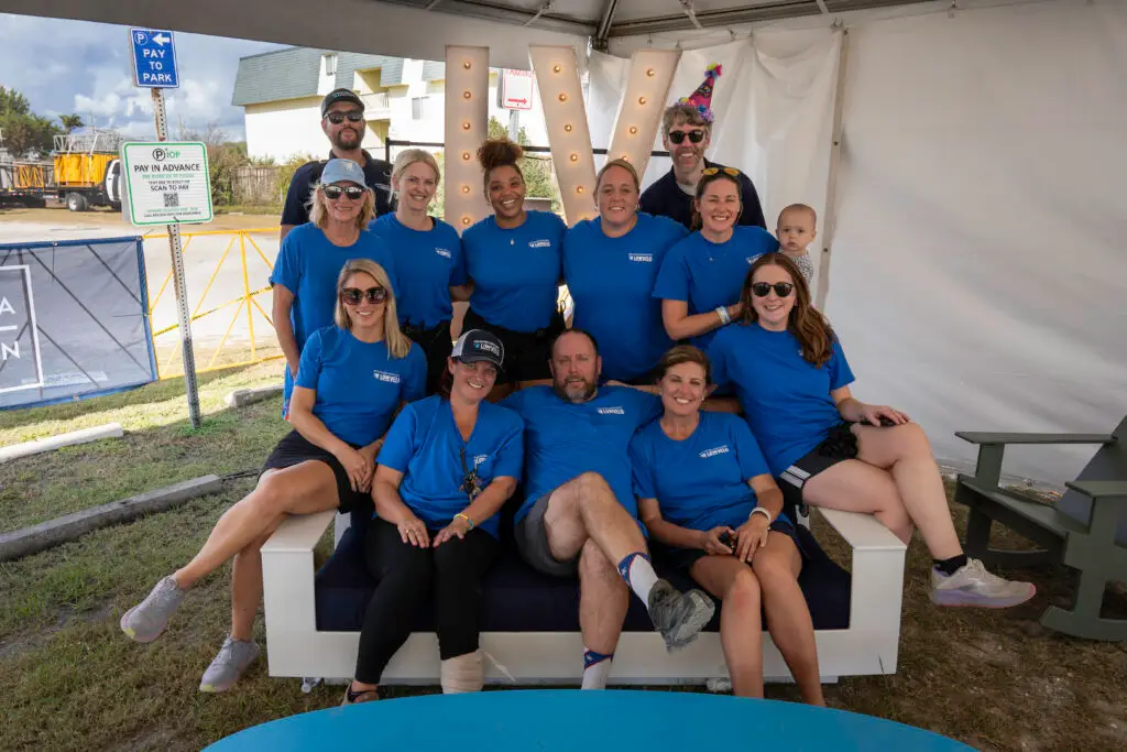 group of Lowvelo staff members in blue t shirts